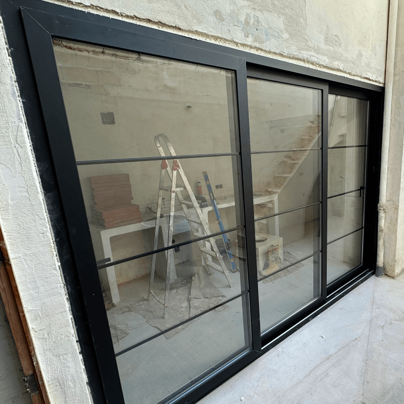 Sistema corredero REHAU en balcón